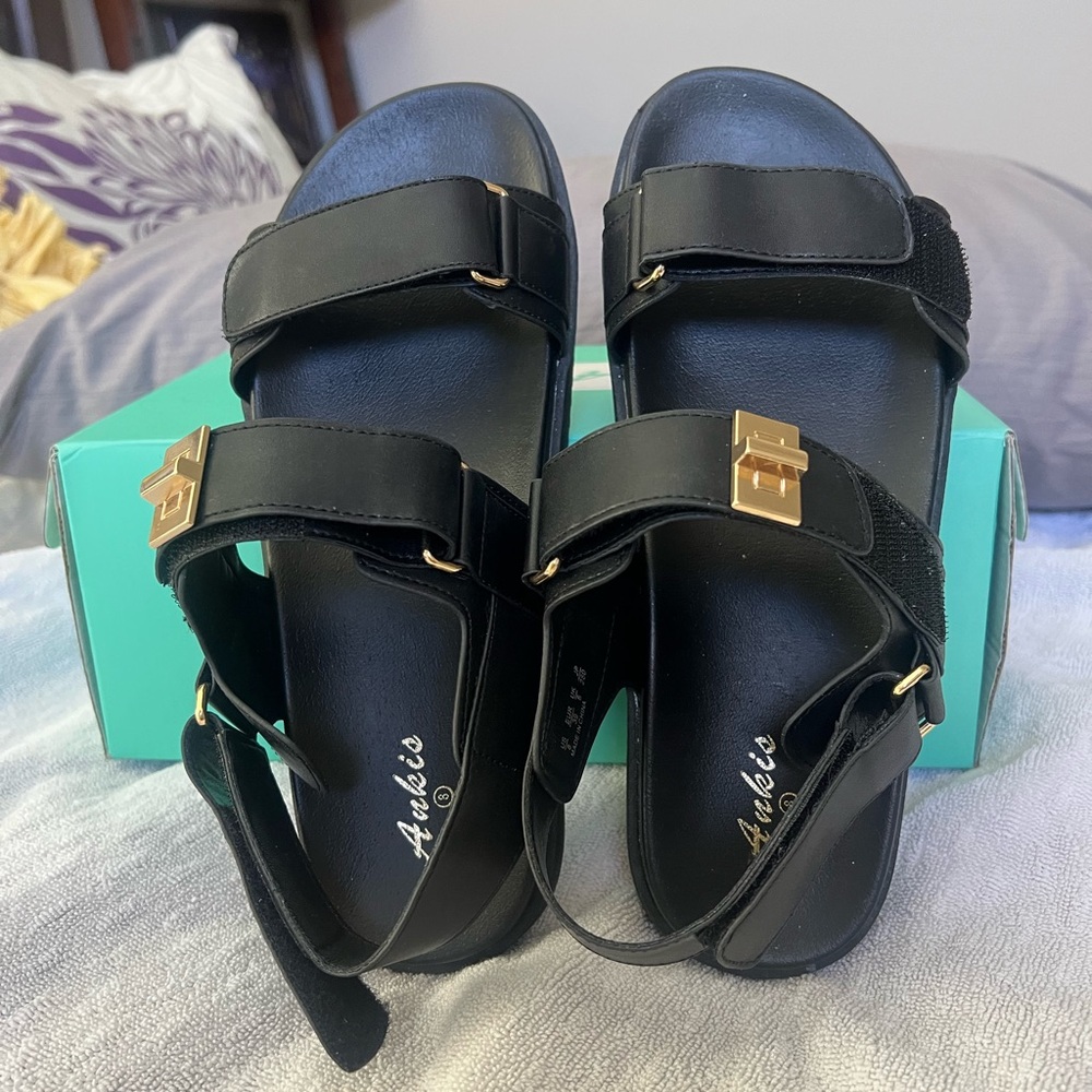 Black Women’s Ankle-Strap Sandals with Gold Buckle Accent